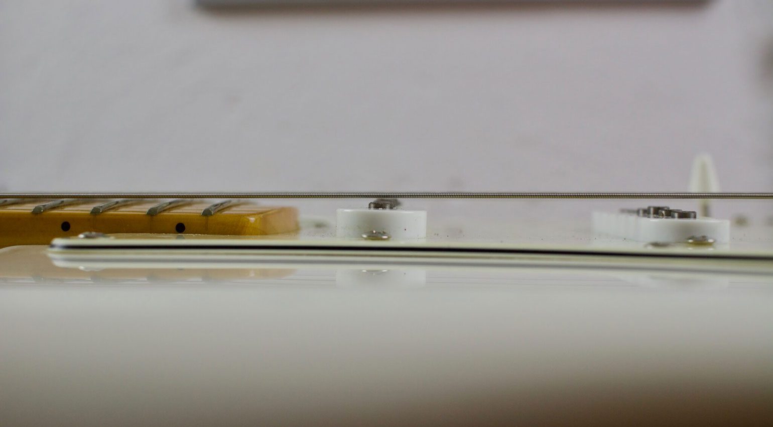 Ajustement de ramassage de la guitare