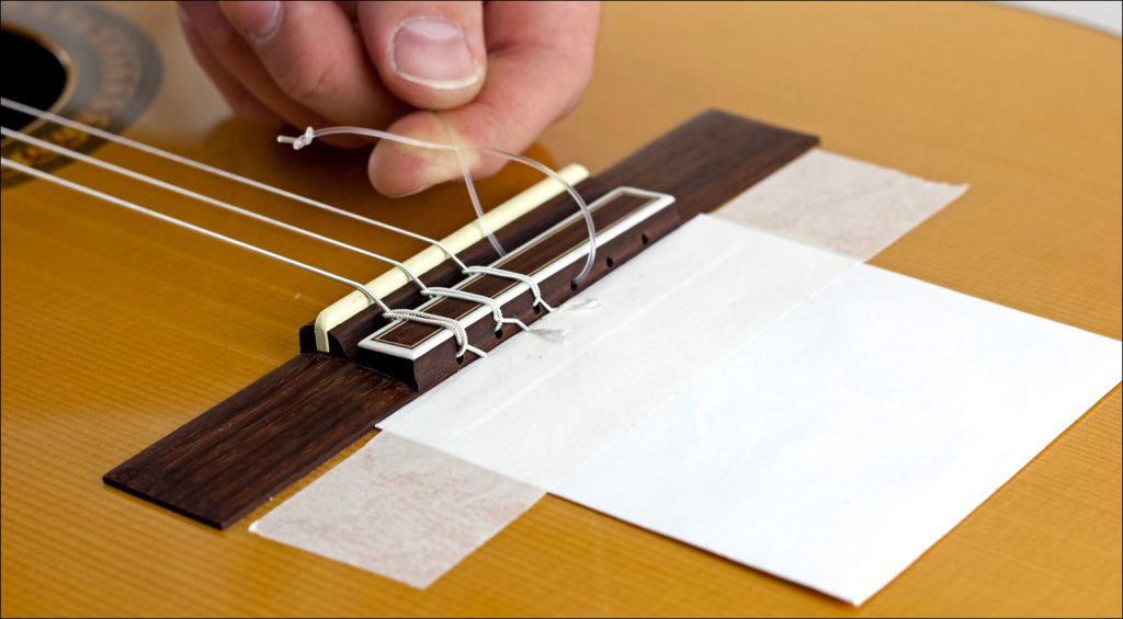 Changer les cordes de guitare