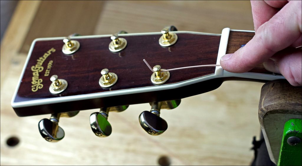 Changer les cordes de guitare